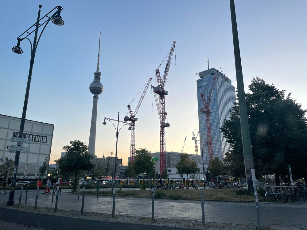 Real-world bike part testing of carbon seatposts and handlebars for gravel, with bikepacking tour through Germany stopping in Alexanderplatz, Berlin.